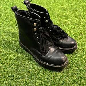 Black leather lace up boots